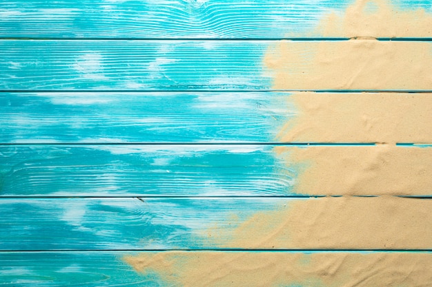 Sea sand on blue wooden floor,Top view with copy space