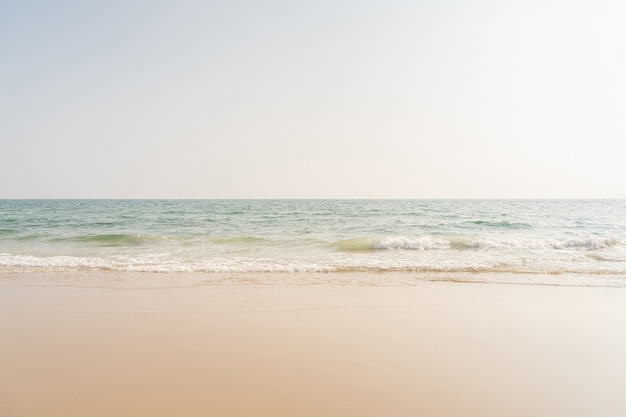 Sea and sand on tropical beach for vacation background.