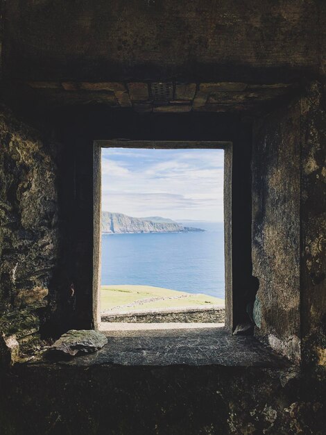 Photo sea seen through window