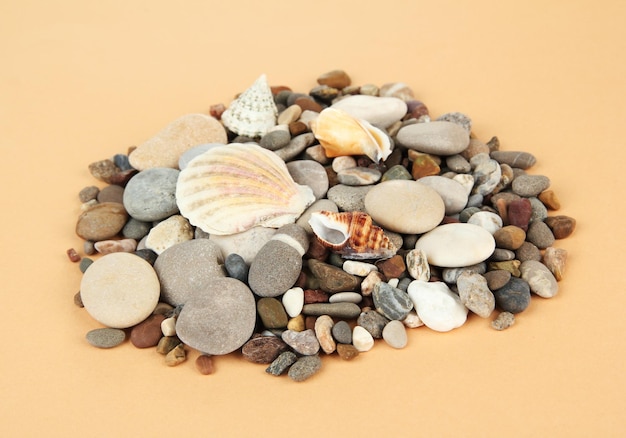 Sea stones on color background