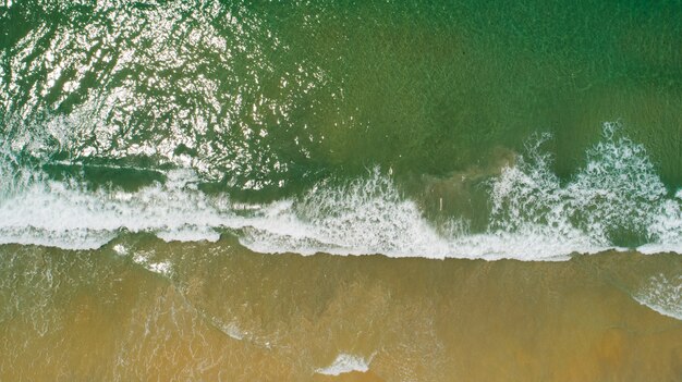 Sea surface texture Beautiful tropical beach sand Top view.