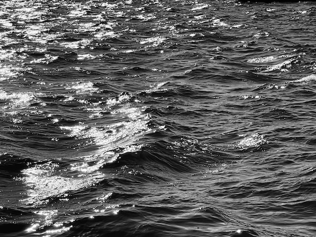 Sea texture and coastal nature concept ocean water as black and white monochrome surface background