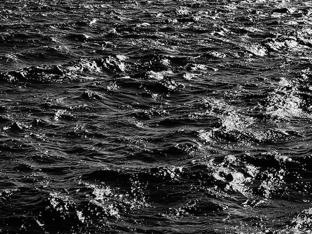 Sea texture and coastal nature concept ocean water as black and white monochrome surface background