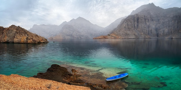 Sea tropical dawn landscape with mountains and fjords Oman