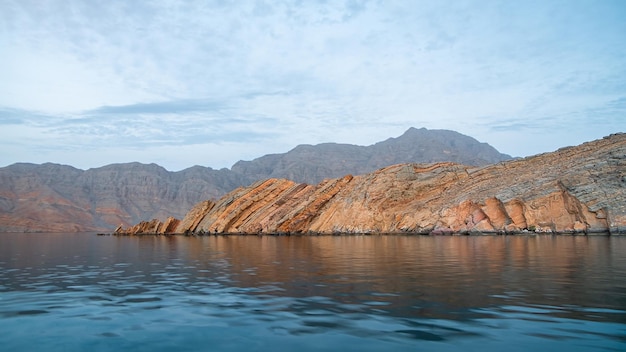 Sea tropical landscape with mountains and fjords Oman