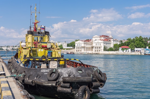 Sea tug at the pier