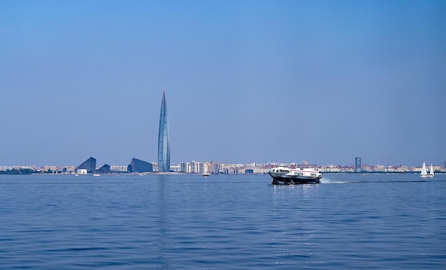 Sea vessel on the river near the city tourism