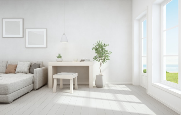 Sea view living room and small working area of modern luxury beach house.