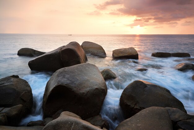  sea wave on the beach at sunset time