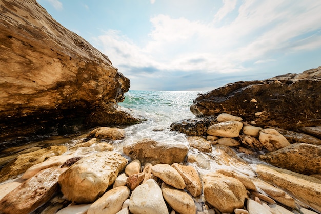 Sea wave on a rocky shore