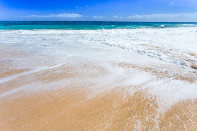 Sea wave and sand beach