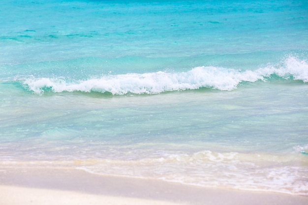 Sea waves on beach at resort