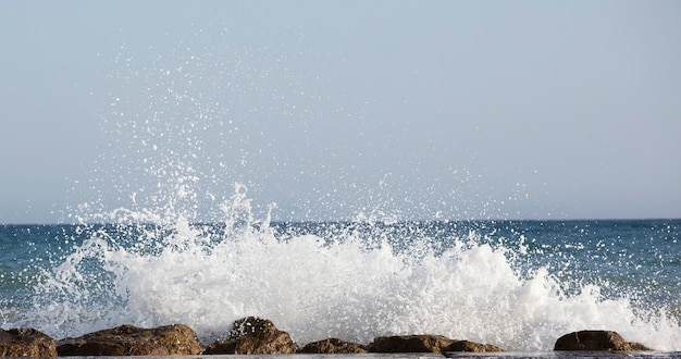 Sea waves crashing against the rocks