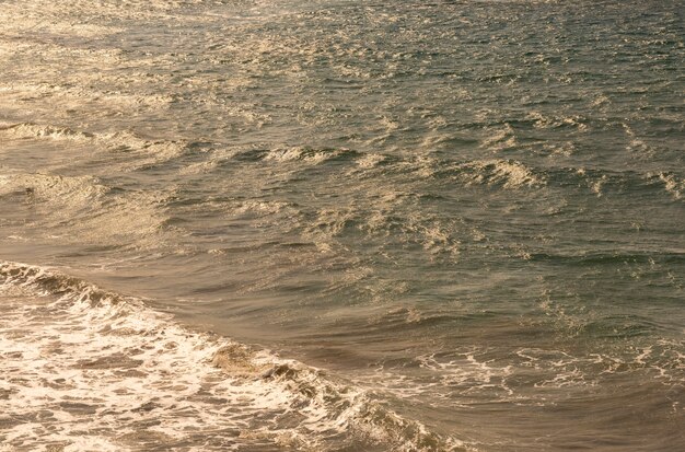 Sea waves crashing on the beach