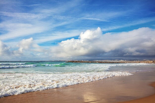 Seacoast of Costa da Caparica city View of Lisbon fron Costa da Caparica beach Almada Portugal