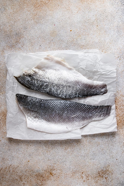 海鮮 魚 スズキ 切り身 食事 食べ物 おやつ テーブルの上 コピースペース 食べ物 背景 上