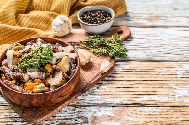 Seafood mix in a wooden bowl