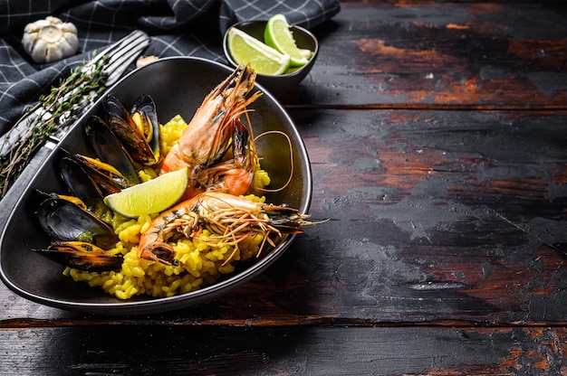 Seafood paella with prawns and mussels