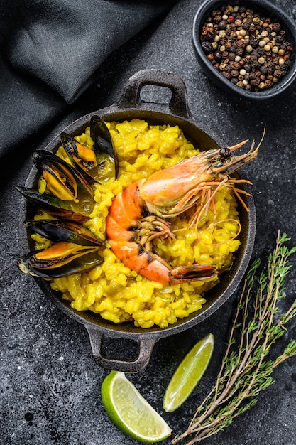 Seafood paella with prawns or shrimps and mussels