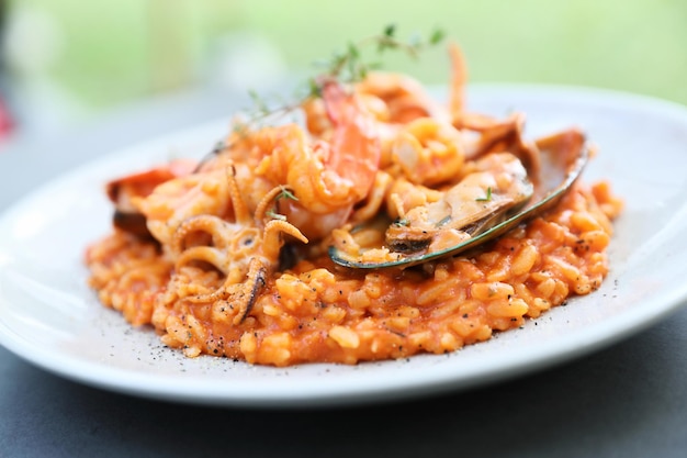 Seafood risotto with mussel shrimp and squid , italian food