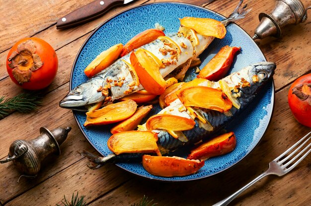 Seafood roasted mackerel Fish scomber in persimmon fruit