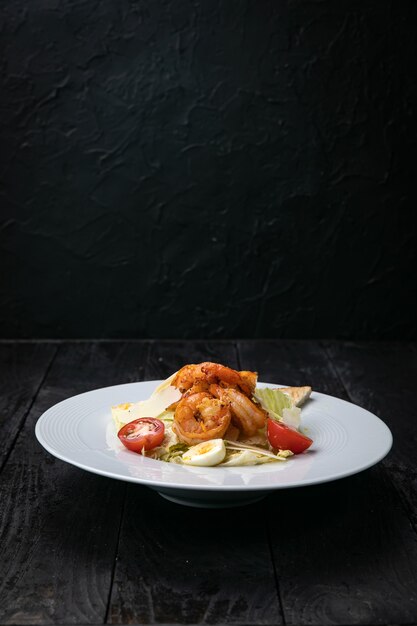 seafood salad on a dark table