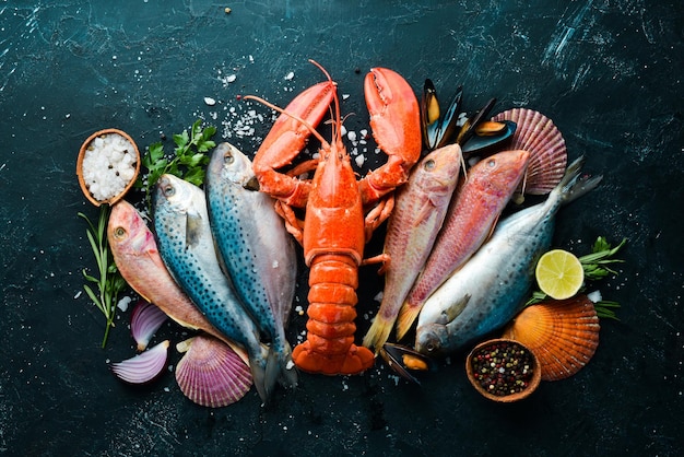 Seafood on stone background Lobster fish shellfish Top view Free copy space