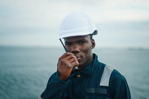 Photo seaman ab or bosun on deck of vessel or ship