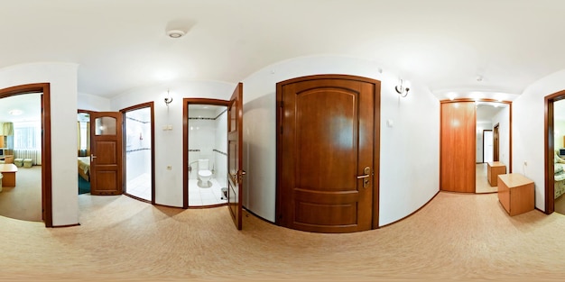 Seamless 360 panorama in corridor of living room of cheap hotel\
flat or apartments with sofa chairs and tv in equirectangular\
projection with zenith and nadir vr ar content