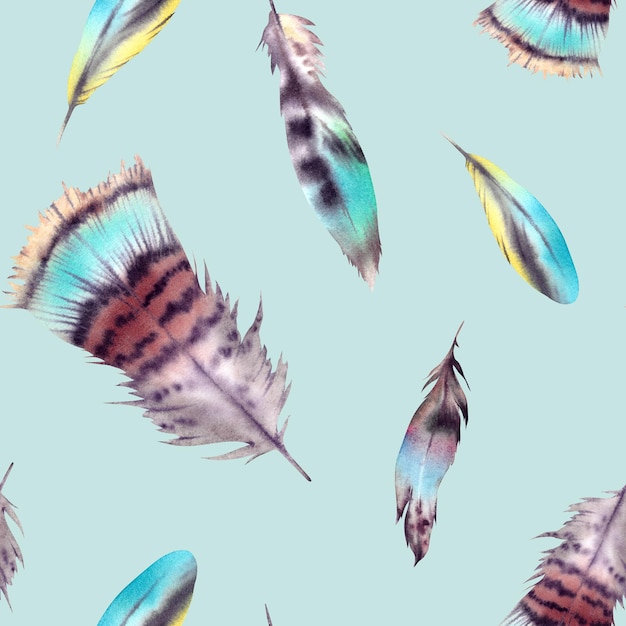 seamless feather pattern the illustration is handpainted executed in watercolor beautiful bright multicolored phoenix bird feather on a blue background asian indian native american ornament