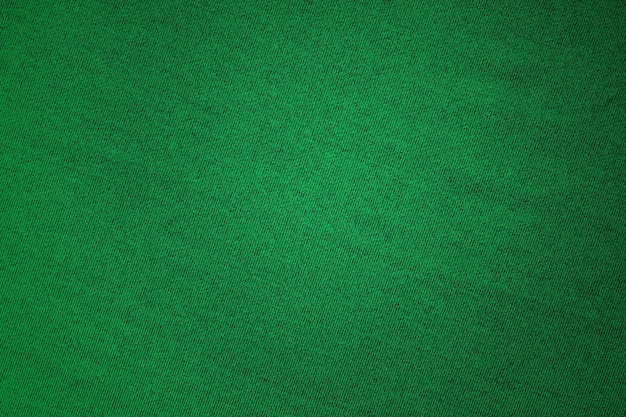 Seamless green cotton fabric close up view for texture background