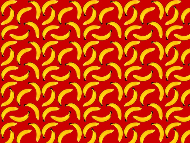 Seamless pattern of bananas on a red background Print for fabric