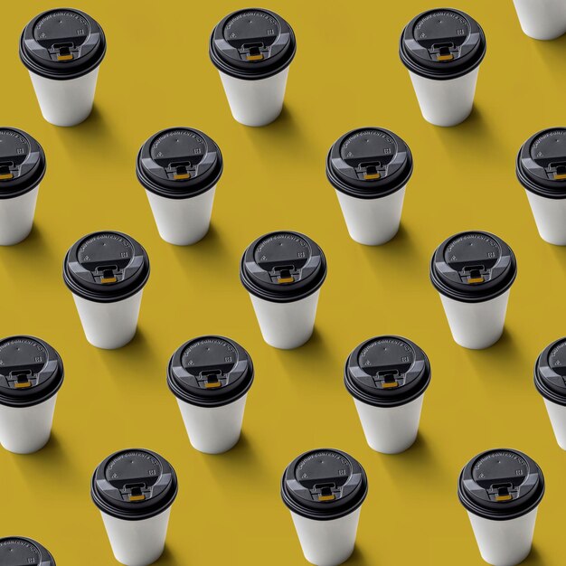 Seamless pattern of a disposable paper cup with a lid for hot coffee and tea on  yellow background.