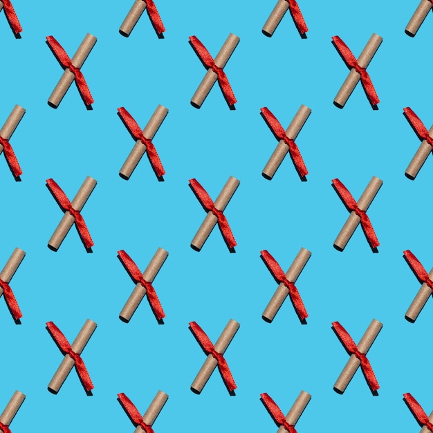 Seamless pattern of love notes from craft paper  tied with a red ribbon on a blue background. Concept for gift shop, site about love relationships