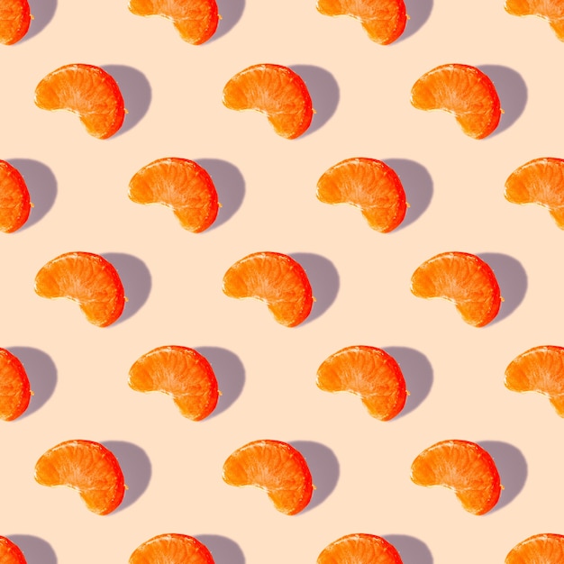 Seamless pattern. Mandarin slice. Use for t-shirt, greeting cards, wrapping paper, posters, fabric print.