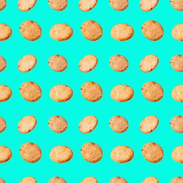 Seamless pattern oatmeal cookies on a green background