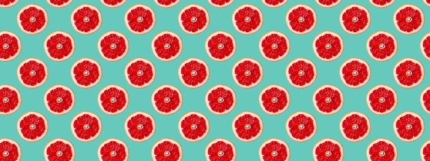 Seamless pattern of red orange slices.