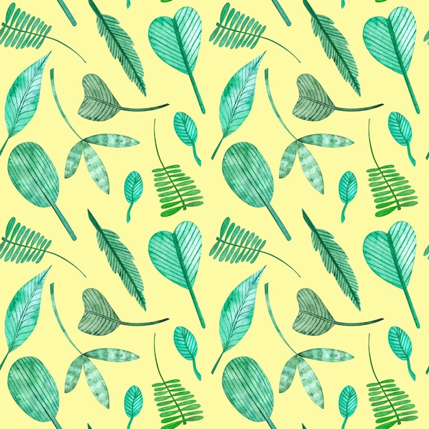 Seamless pattern of watercolor leaves on yellow background