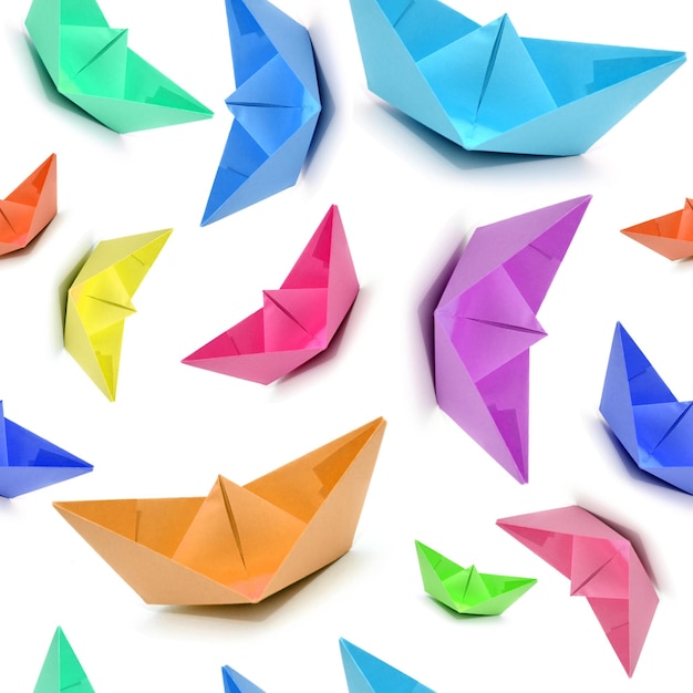 Seamless pattern with colored boats origami boats seamless ori