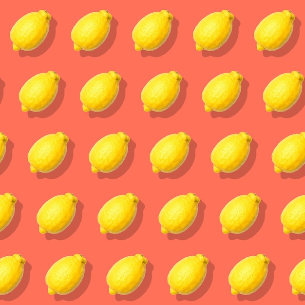 Seamless pattern with lemon. Abstract red background