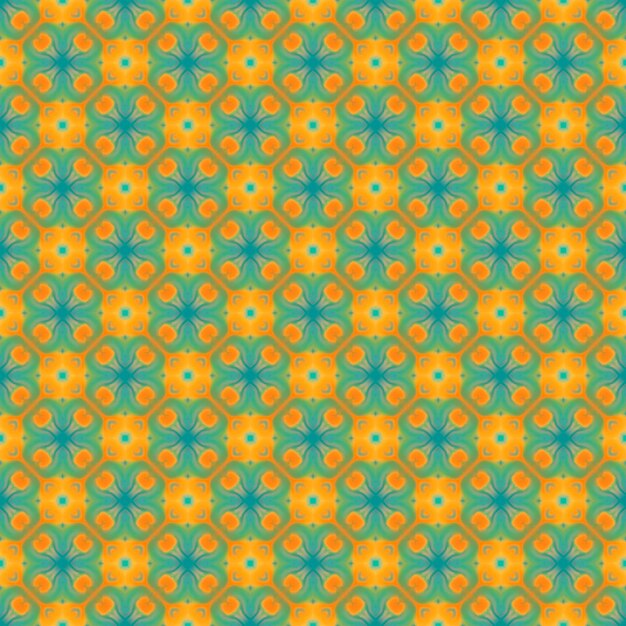 Photo a seamless pattern with orange and blue flowers on a green background.