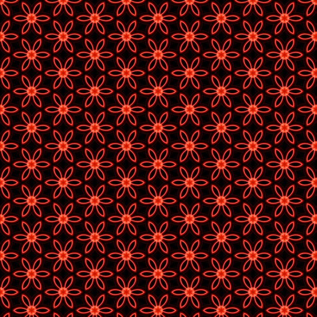 A seamless pattern with orange flowers on a black background.