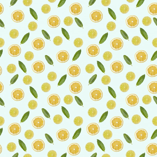 Photo seamless pattern with a picture of lemon, lime and mint.