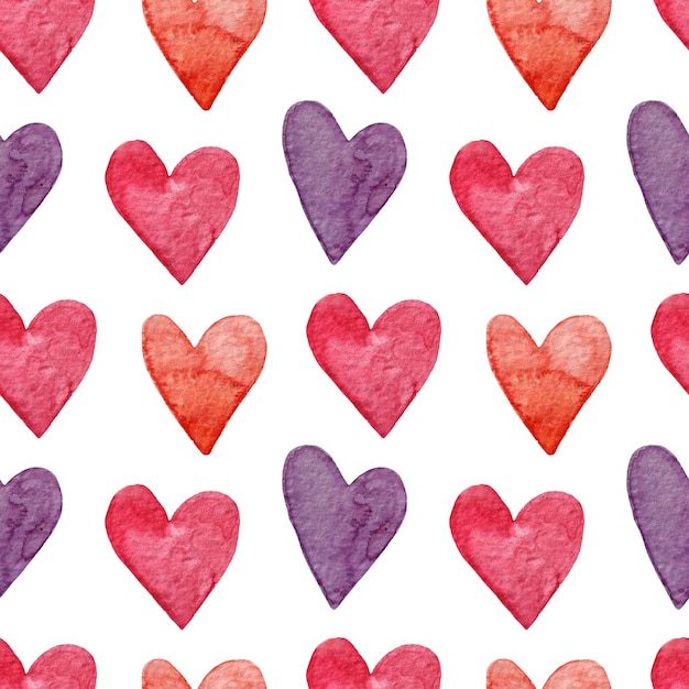 Seamless pattern with purple and pink hearts on a white background