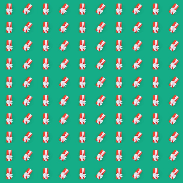 사진 녹색 배경 위에 빨간색 선물 상자와 함께 완벽 한 패턴