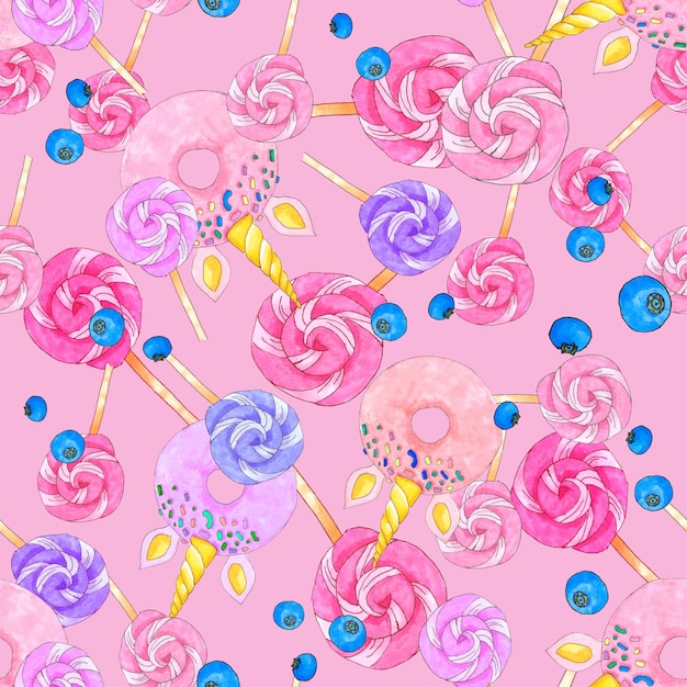 Seamless pattern with sugar candies, unicorn shaped donuts and blueberries on bright pink background.