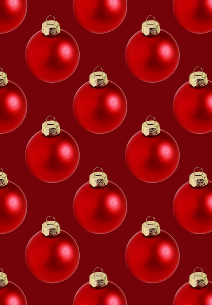 Seamless red christmas balls pattern on red background