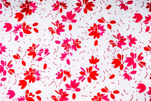 Seamless red floral texture made of petals fiber japanese paper pattern on a white background