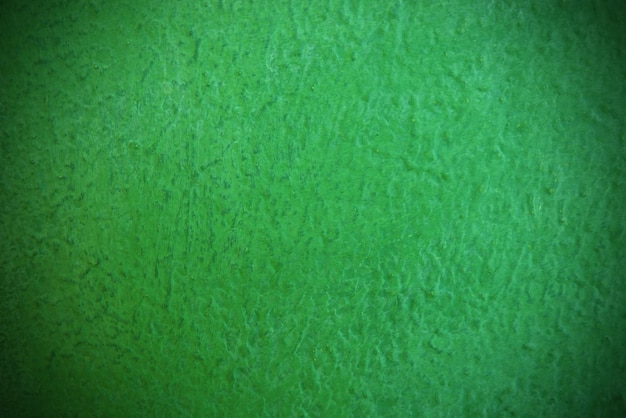 Seamless texture of painted green cement old wall a rough surface with space for text for a backgroundx9