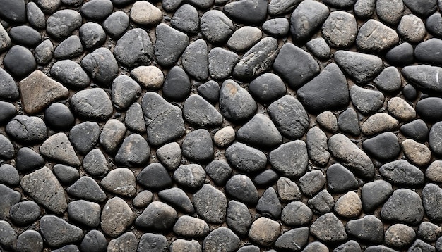 Seamless texture of pebbles background for design black pebbles stone wall decorate texture